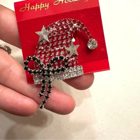 Rhinestone Santa hat brooch pin with black bow and silver-tone stars - Picture 2 of 4
